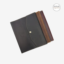 Load image into Gallery viewer, Franklin-Christoph A5 boot leather notebook cover in brown or maroon with snap closure and debossed logo.