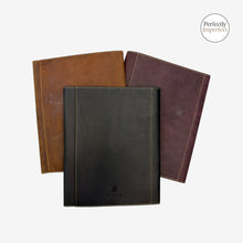 Load image into Gallery viewer, Franklin-Christoph A5 boot leather notebook covers in black, brown, and maroon with snap closure and debossed logo.