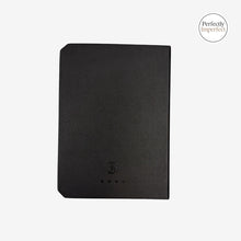 Load image into Gallery viewer, Franklin-Christoph A6 black Firma-Flex journal with debossed Celtic Knot logo and beveled corners.