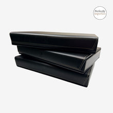 Load image into Gallery viewer, Franklin-Christoph black napa leather covered pen tray for 7 pens, with red fabric interior and magnetic closure.