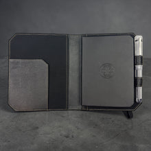 Load image into Gallery viewer, Franklin-Christoph black leather Command Center Padfolio with tan stitching, pen slot, and embossed logo.