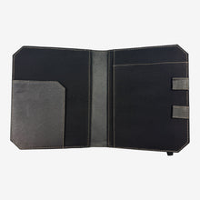 Load image into Gallery viewer, Franklin-Christoph black leather Command Center Padfolio with tan stitching, elastic closure, and interior pockets.