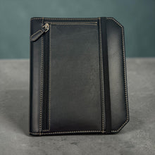 Load image into Gallery viewer, Franklin-Christoph black leather Command Center Padfolio with tan stitching, elastic closure, and zippered pocket.