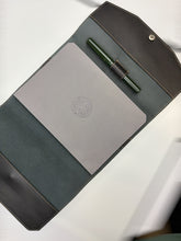 Load image into Gallery viewer, Franklin-Christoph A5 black napa leather notebook cover with snap closure, pen loop, and interior pockets.