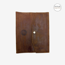 Load image into Gallery viewer, Franklin-Christoph A5 boot leather notebook cover in brown with snap closure and debossed Celtic logo.