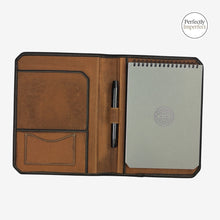Load image into Gallery viewer, Franklin-Christoph brown canvas A5 padfolio with pen holder, card slot, and document flap. Includes a grey notebook.