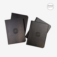 Load image into Gallery viewer, Franklin-Christoph Firma-Flex A5 journal notebook with debossed Celtic knot logo on black Firma-Flex cover. Lays flat, sewn bound, 96 sheets.