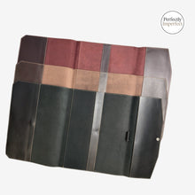 Load image into Gallery viewer, Franklin-Christoph A4 snap notebook cover in black FxCel leather with snap closure and interior pockets. Imperfectly perfect.