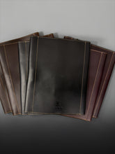 Load image into Gallery viewer, Franklin-Christoph A5 FxCel leather notebook cover in black with snap closure, debossed logo, and contrast stitching.
