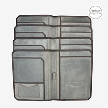 Load image into Gallery viewer, Franklin-Christoph A5 padfolio in grey canvas with dark brown stitching, multiple pockets, and pen loop. Perfectly Imperfect logo.
