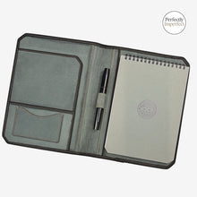 Load image into Gallery viewer, Franklin-Christoph A5 grey canvas padfolio with pockets for cards and documents, a pen loop, and a spiral-bound notebook.
