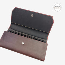 Load image into Gallery viewer, Franklin-Christoph Penvelope Lucky 13 maroon distressed leather pen case with 13 slots and snap closure.