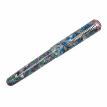 Load image into Gallery viewer, Franklin-Christoph Model 31 Omnis fountain pen with a multi-colored acrylic barrel in blue, green, and purple hues, featuring a silver clip.