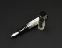 Load image into Gallery viewer, pocket 20 fountain pen in semi-translucent ascension wing acrylic uncapped on dark background